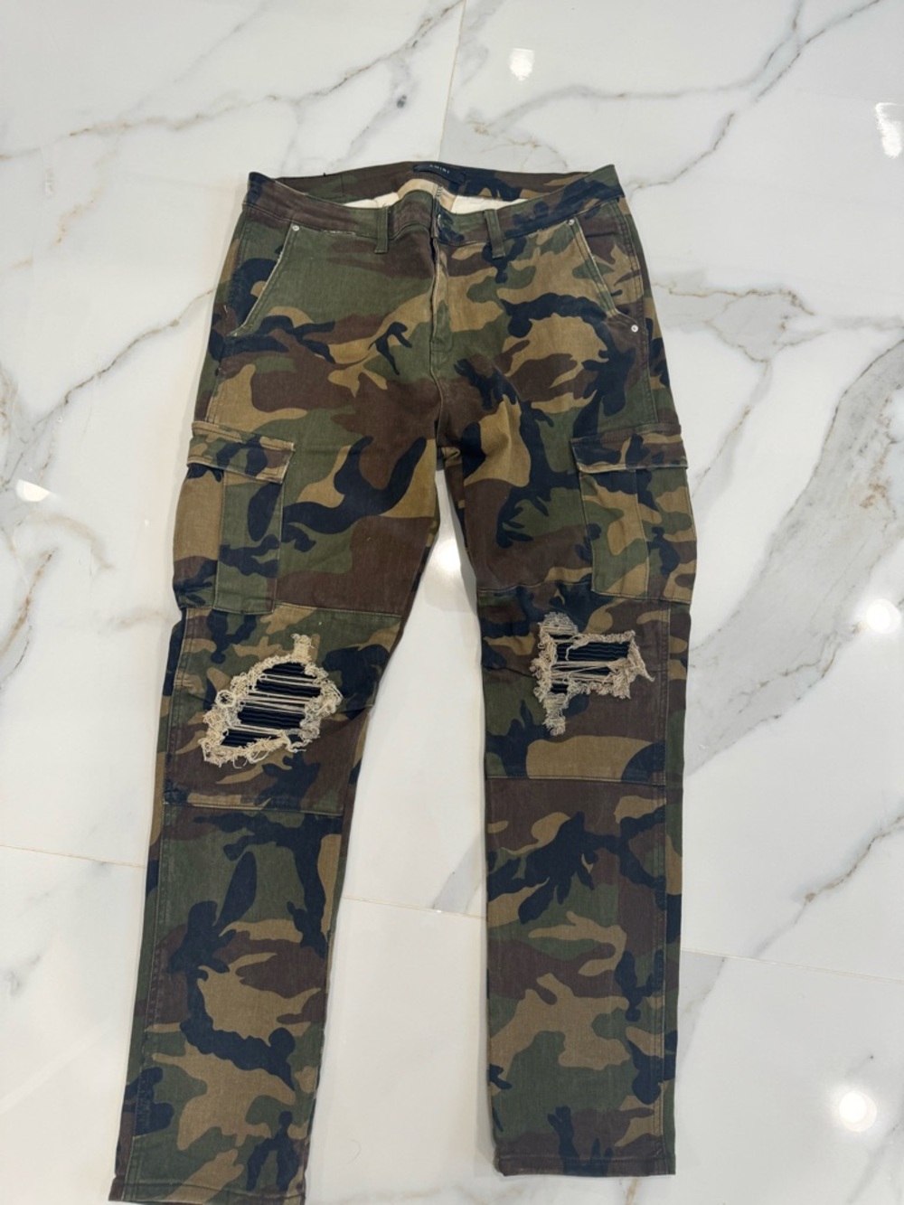 🔥 Rare AMIRI Camouflage Distressed Cargo Pants
Men’s Size 36
